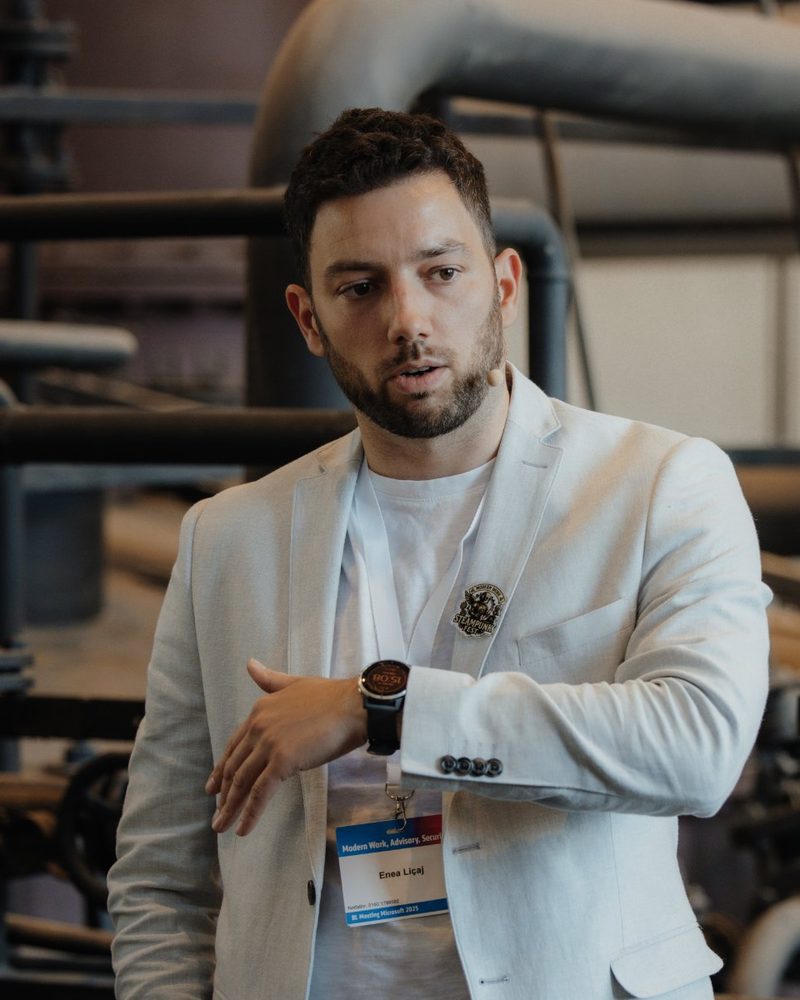 Enea Liçaj giving a talk